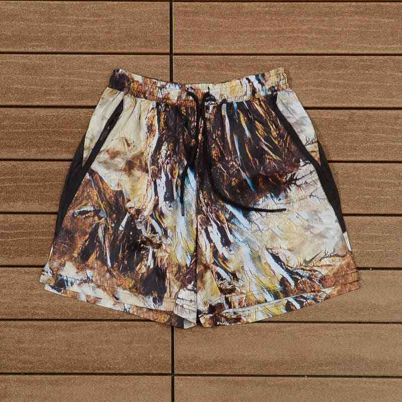 Conjunto Nike x NOCTA Running Camo