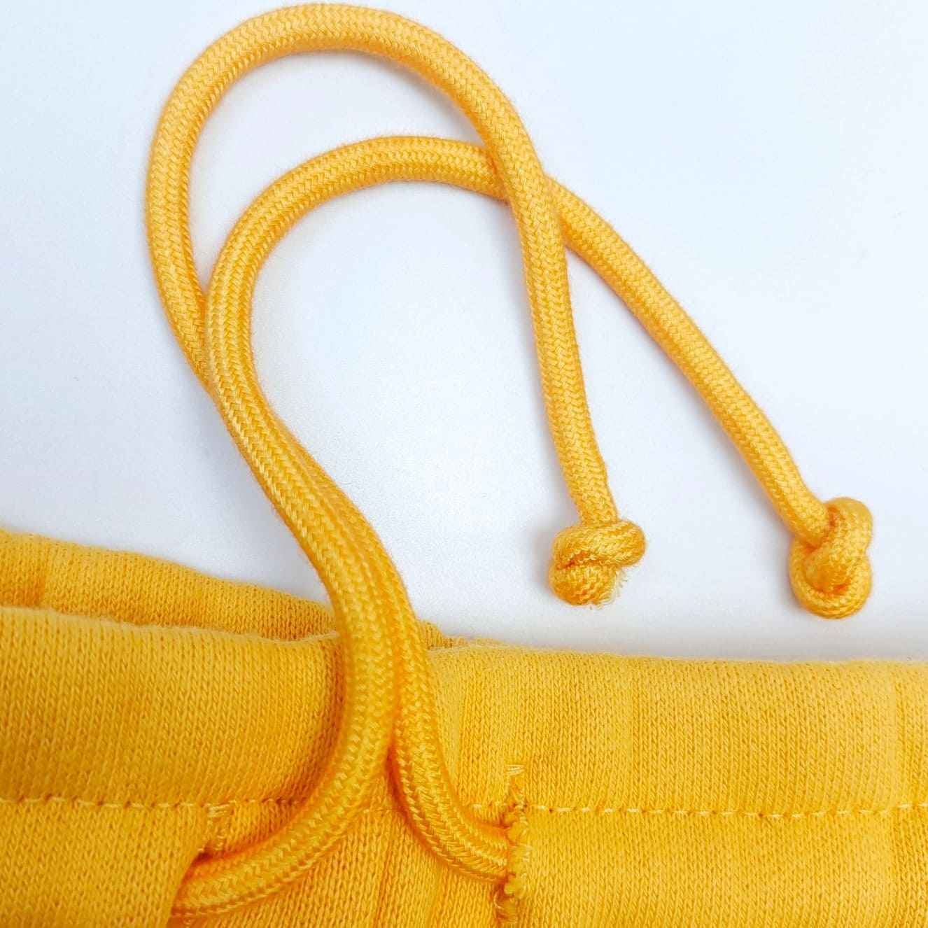 Calça Denim Tears Wreath x CPFM Yellow